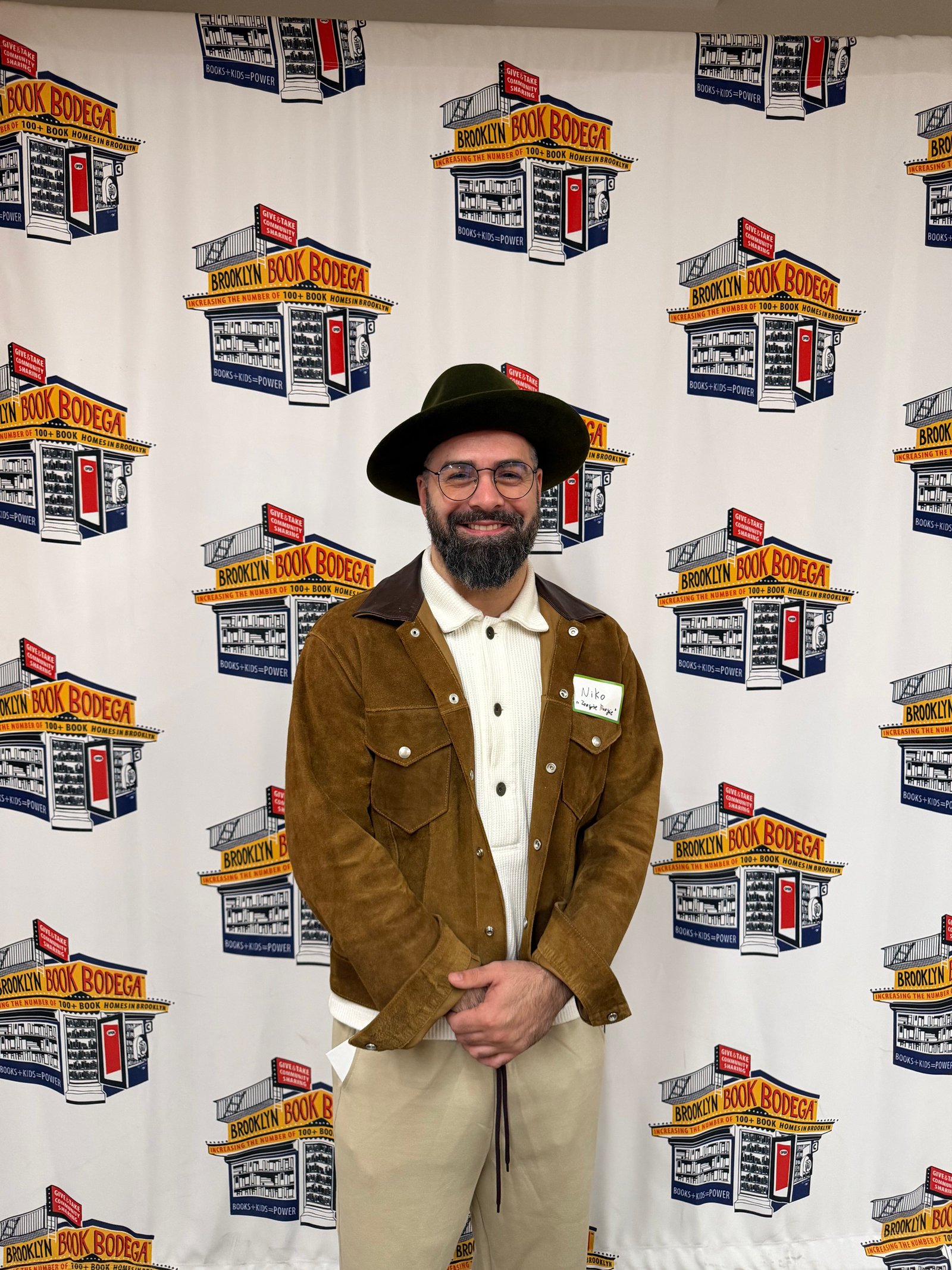 Kids magician performing an interactive magic show for children at a New York City family shelter event