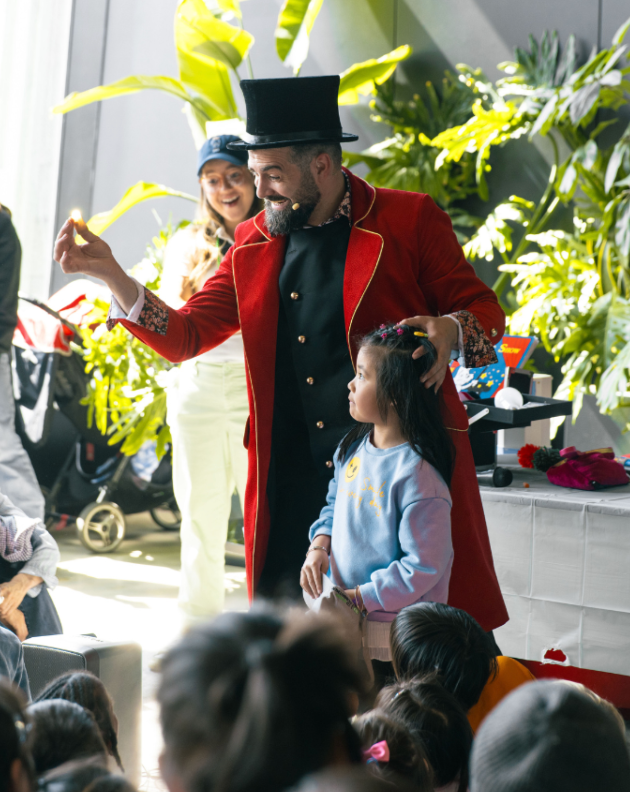 Kids magician performing an interactive magic show at a Brooklyn birthday party